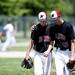 Milan pitcher Thomas Lindeman and Evan Peacock talk at the end of an inning during the game against Richmond on Friday, June 14. Daniel Brenner I AnnArbor.com